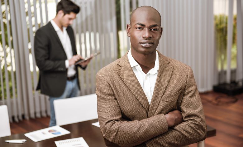 close up of calm businessman calm with crossed arms